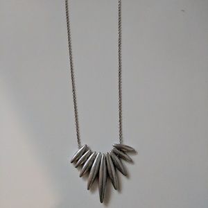 Long, silver necklace